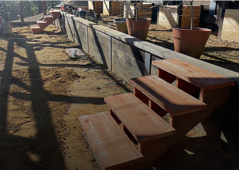 Wooden steps in a construction site.